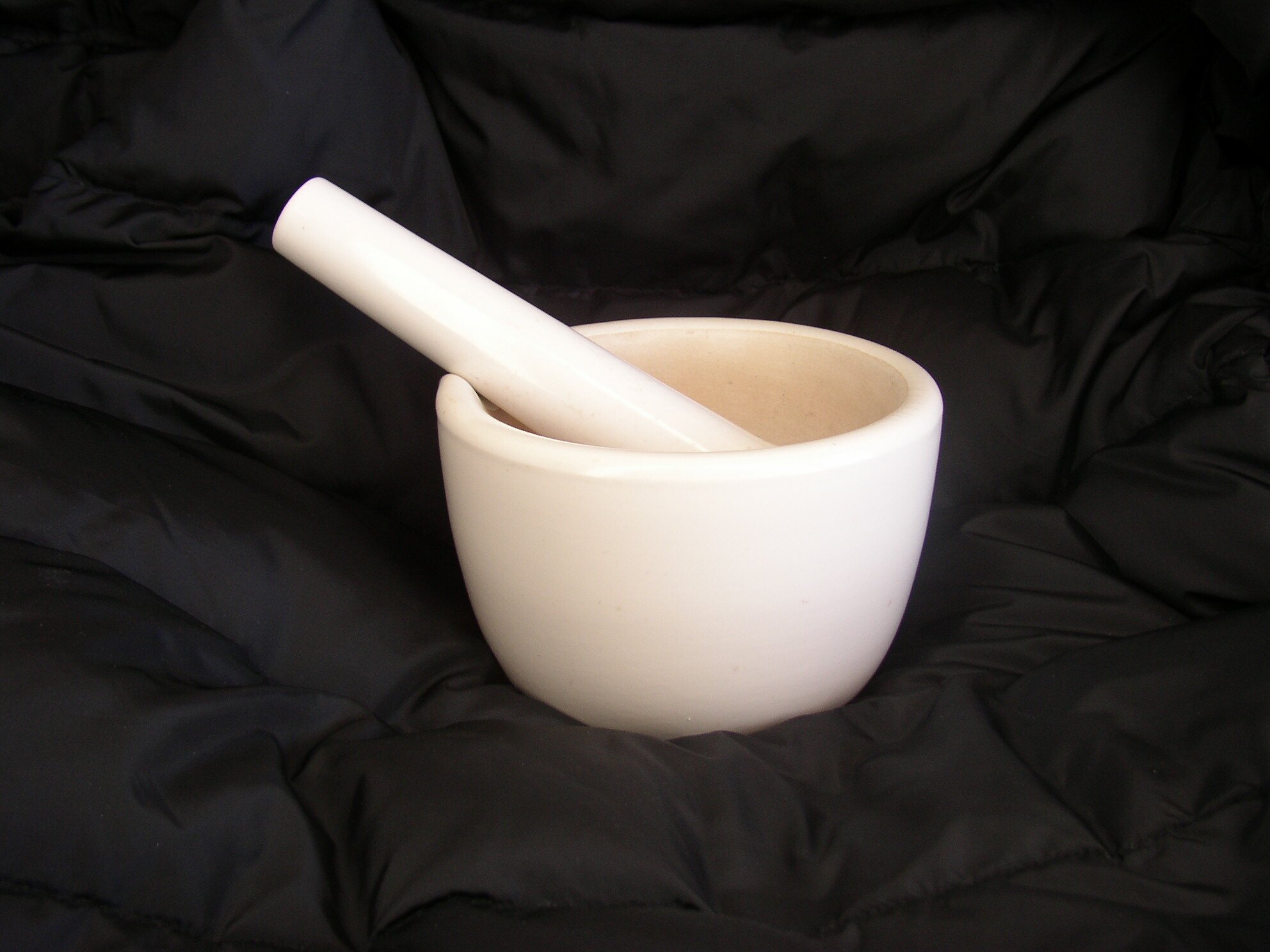 The mortar and pestle are as old a herbal medicine itself. Traditionally made of clay, but also of iron, granite, and other materials, they serve for crushing, blending, etc. of items placed in them. Some are round and others are oval. Size ranges from tiny to very large.